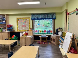 Northern Virginia Academy of Early Learning Burke Campus - three year old room with window and toys