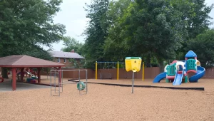 Northern Virginia Academy - Lincolnia Campus - Playground with swings and other age-appropriate stuctures